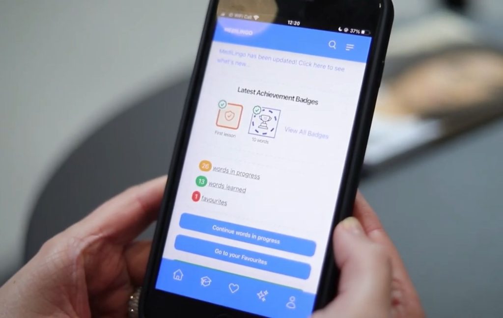MediLingo app on a mobile device. Screen shows achievement badges and progress of learned words.